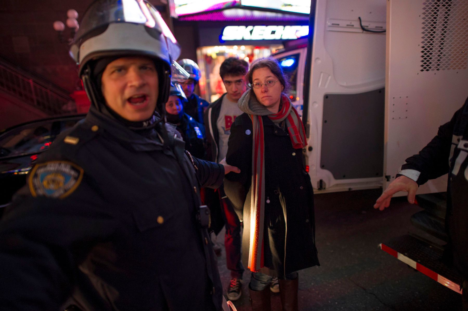 12/04/2014: Tensions ran high near Times Square in NYC. Police officers arrested over a dozen protesters around 10pm while the crossed 7th Ave and 42nd St. 1timessquareprotest2