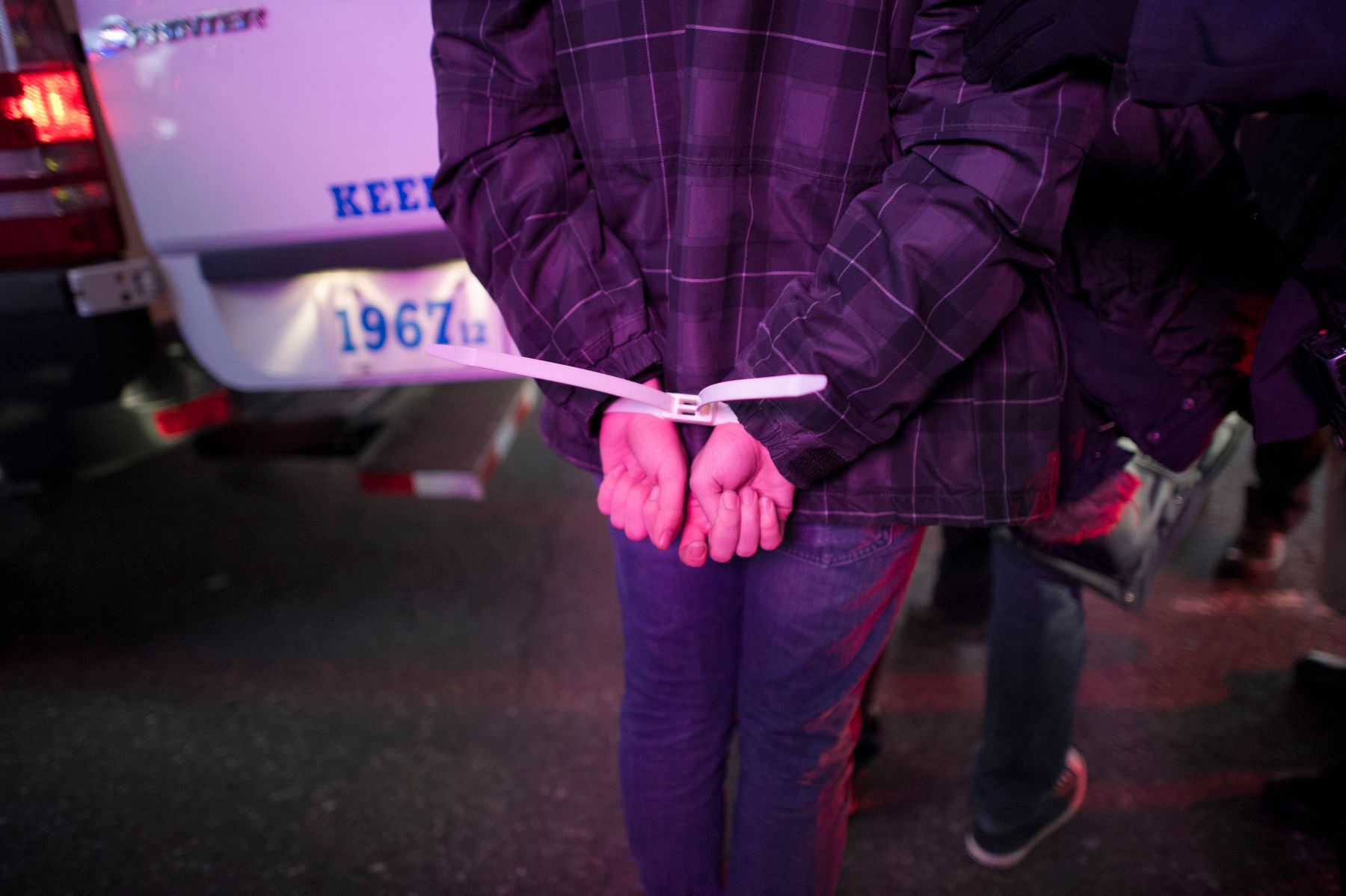 12/04/2014: A protester in Times Square was arrested for obstructing traffic and resisting arrest. 1gjv_3623