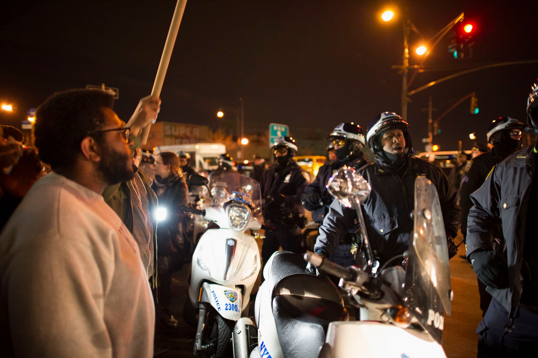 12/04/2014: Protesters squared off against police officers on 17th Ave and The West Side Highway a day after a Grand Jury decided not to indict the officer who killed Mr. Garner with an illegal chokehold. 1gjv_3504