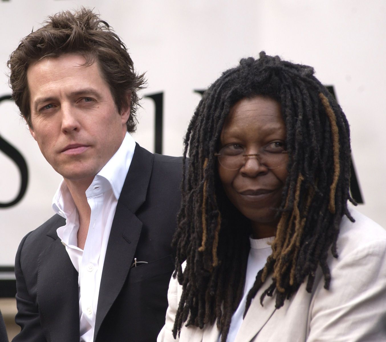 HUGH GRANT and WHOOPI GOLDBERG