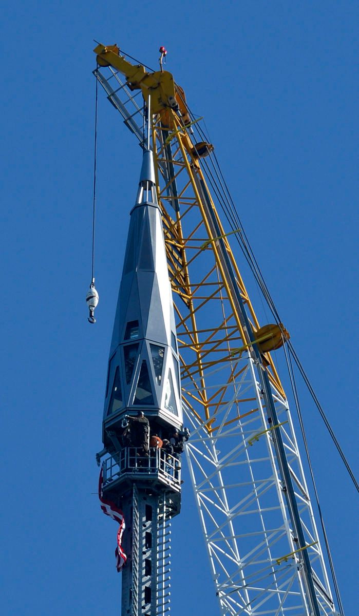 One WTC spire installed.