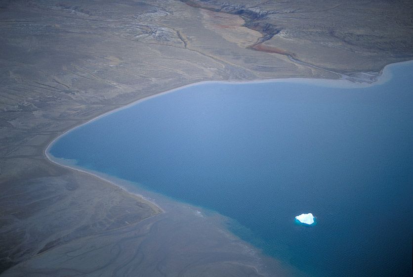 SOLITARY ICEBERG IN A BAY OF OPEN WATER, 1994
