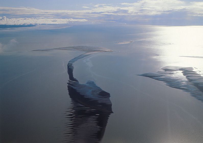 DEADMAN SANDS EMERGE AS TIDE DROPS, KVICHAK RIVER MOUTH AT BRISTOL BAY