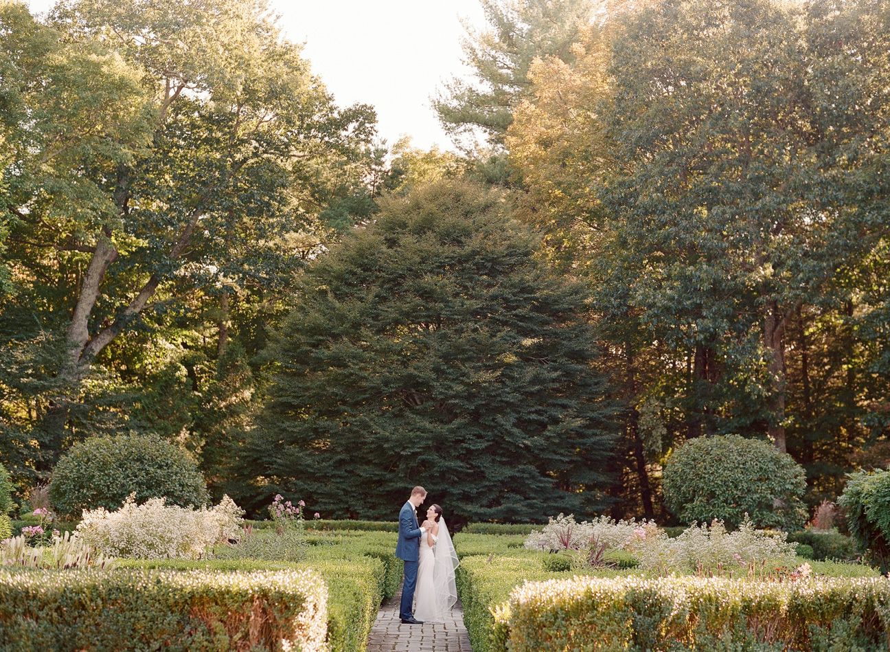 View Fine Art Portfolios Wedding couple dancing in a garden
