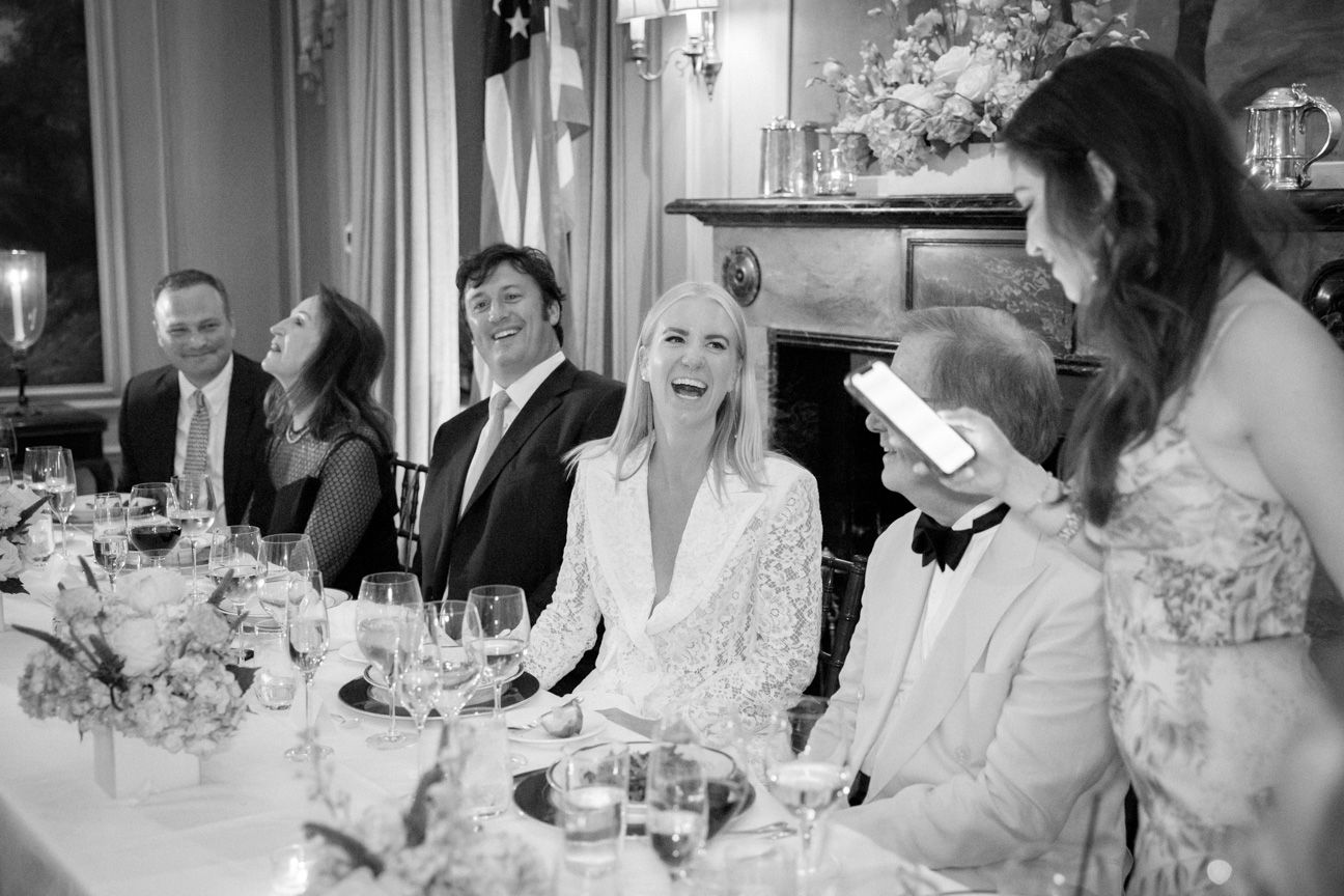 View Fine Art Portfolios Bride and groom laughing at toasts