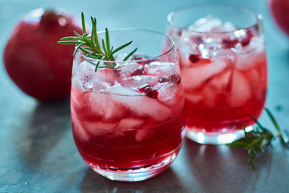 Pomegranate rosemary gin fizz