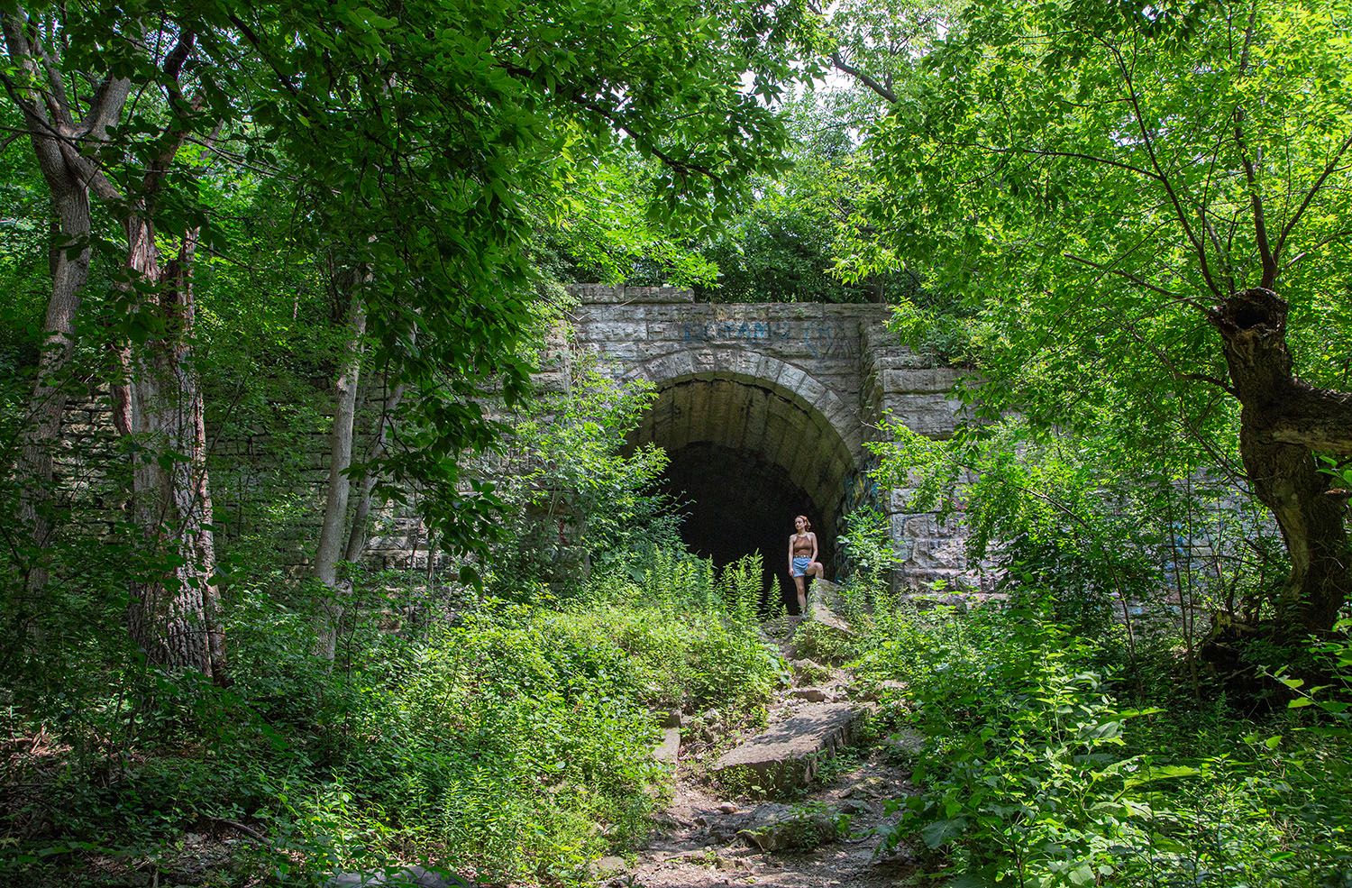 Haley Krob at the "Tunnel to Nowhere" in Cambridge Woods in the Milwaukee River Greenway Haley Krob.jpg