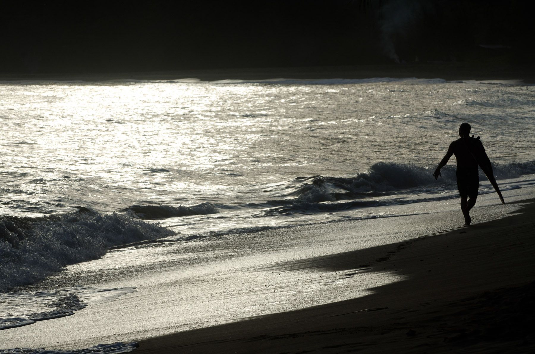 Surfer on Pines beach