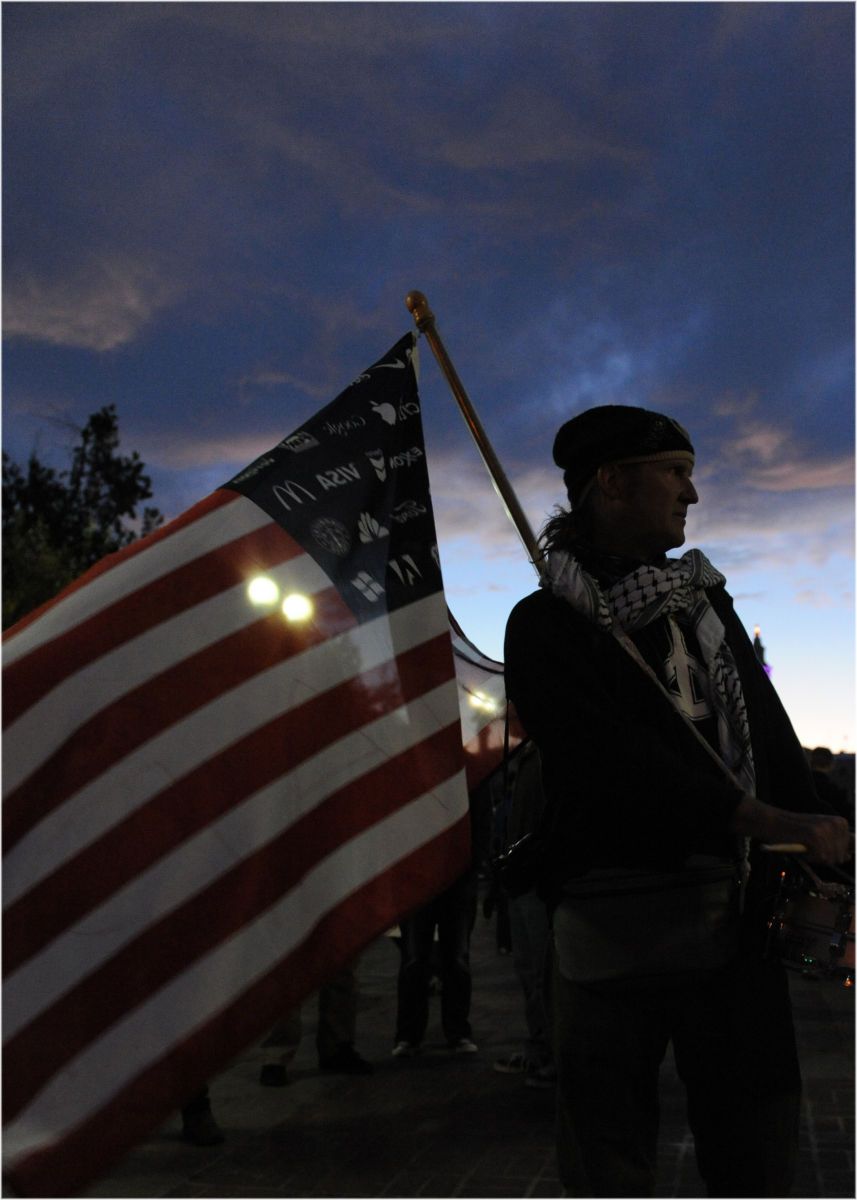 Silhouetted demonstrator in downtown Denver. 1occupy29b