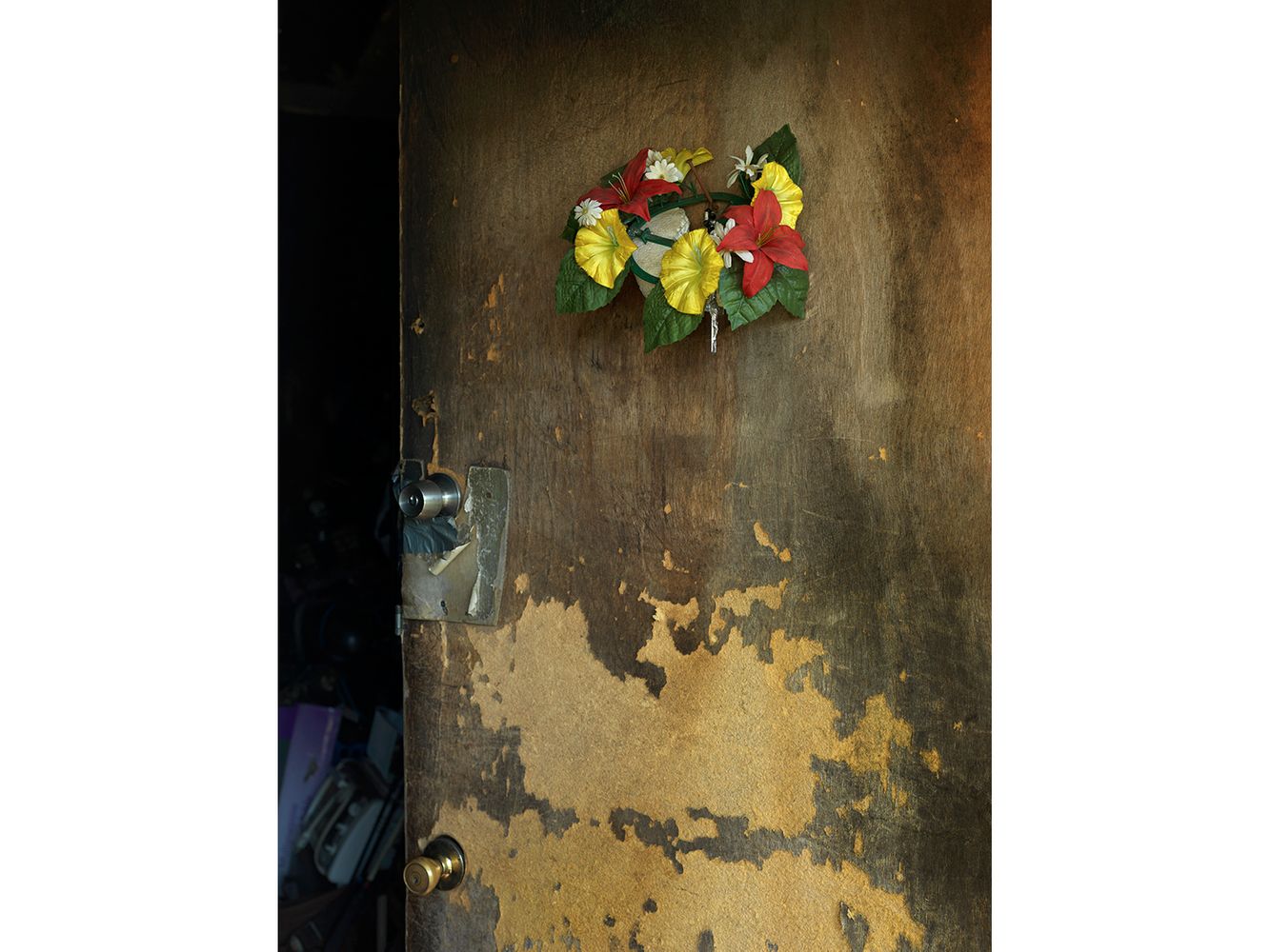 Billy is probably the poorest person I know but I couldn't help but notice this beautiful little decoration he placed on his door. I think it says a lot about overcoming adversity and living life happily. Billy's Front Door, Eastside, Detroit 2014