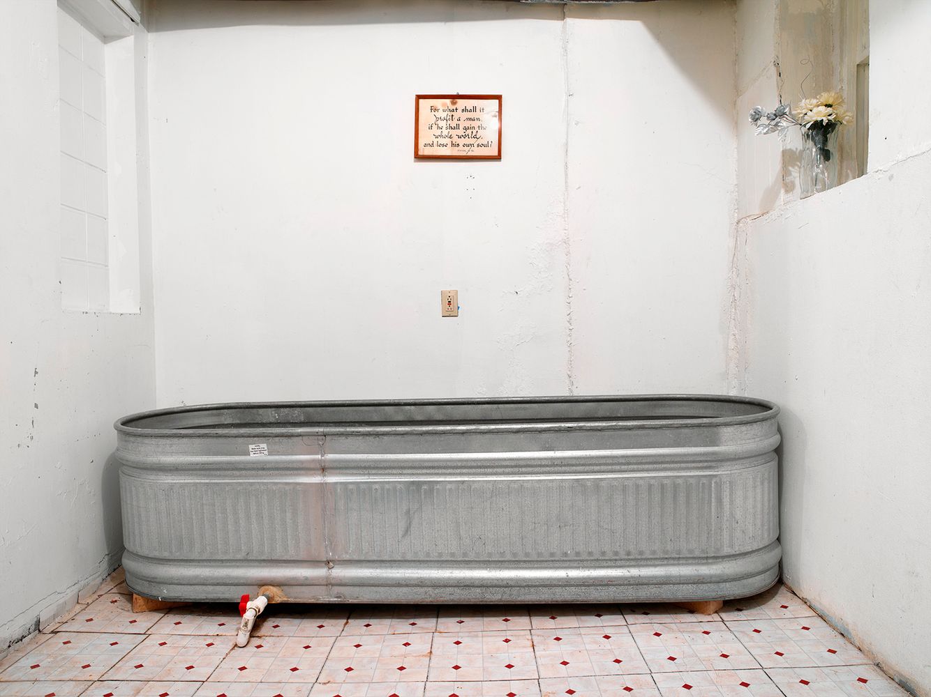 Usually baptismal tubs are positioned in larger community areas, but this tub occupies a very small private room, suggesting that this most pivital moment in ones life is reserved for only very close family members and friends. Baptismal Tub, Apostolic House of Prayer, 1804 W. 63rd, Chicago 2006