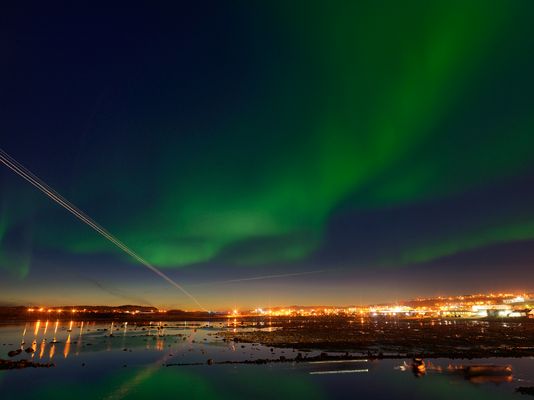 Aurora Borealis with a Trail of Airplane Landing Lights, Iqaluit, Canada 2016