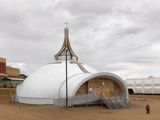 Often referred to as the igloo church, the original structure was built in 1972 but was severely damaged by arson in 2005 and was rebuilt in 2012. St. Jude's Cathedral, Iqaluit, Canada 2016