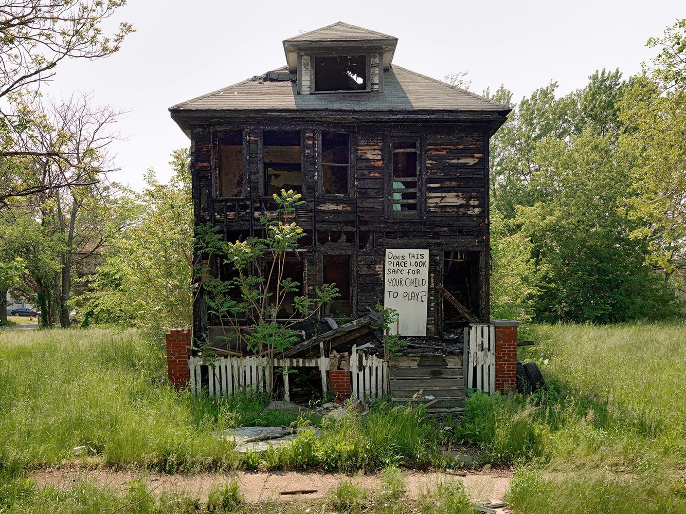 House with Sign Painted by Andre Ventura, Milner St., Detroit 2011