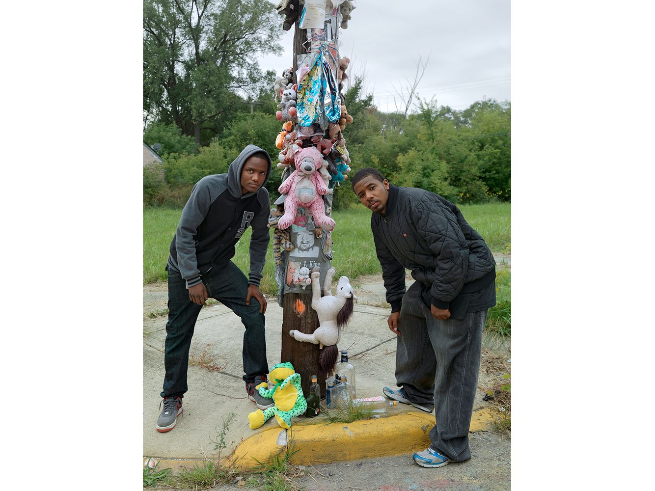 Two Men Pose in Front of a Memorial for their Deceased Friend, Eastside, Detroit 2014