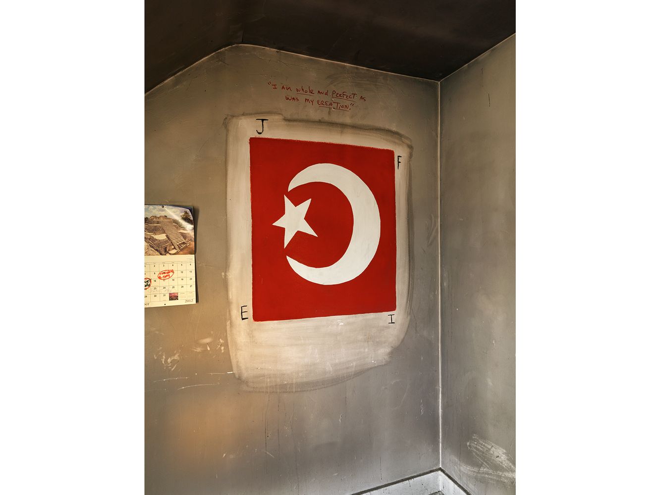 In Islam, the letters J, F, E, and I represent Justice, Freedom, and Equality. Hand Painted Muslim Symbol in Hakeem's Room, Detroit 2012