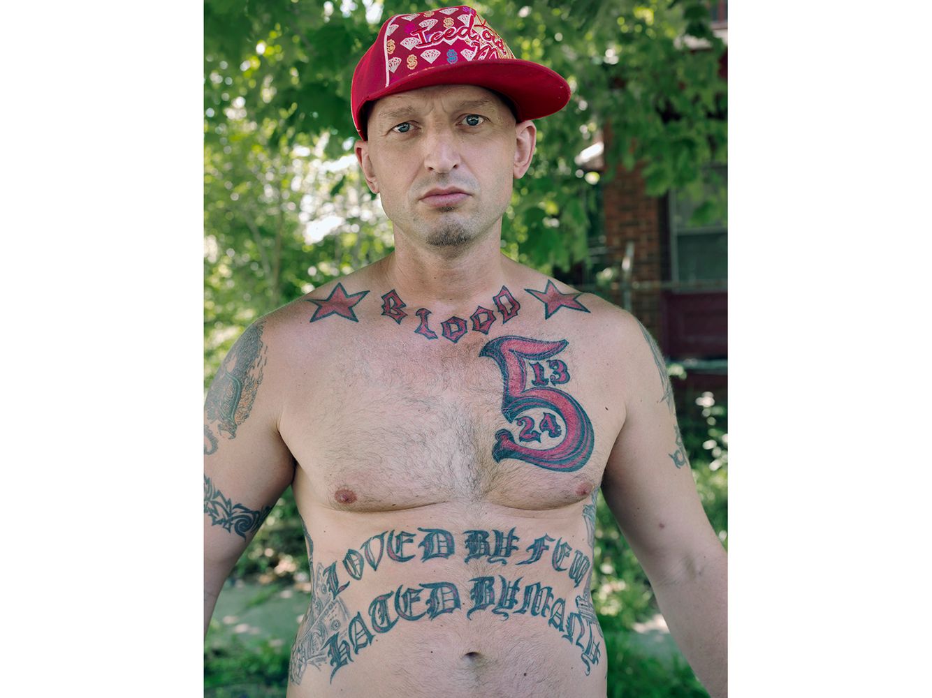 Coz is a member of the Eastside Bloods Street Gang. All of his tattoos were obtained while in prison. Coz, Eastside, Detroit 2010