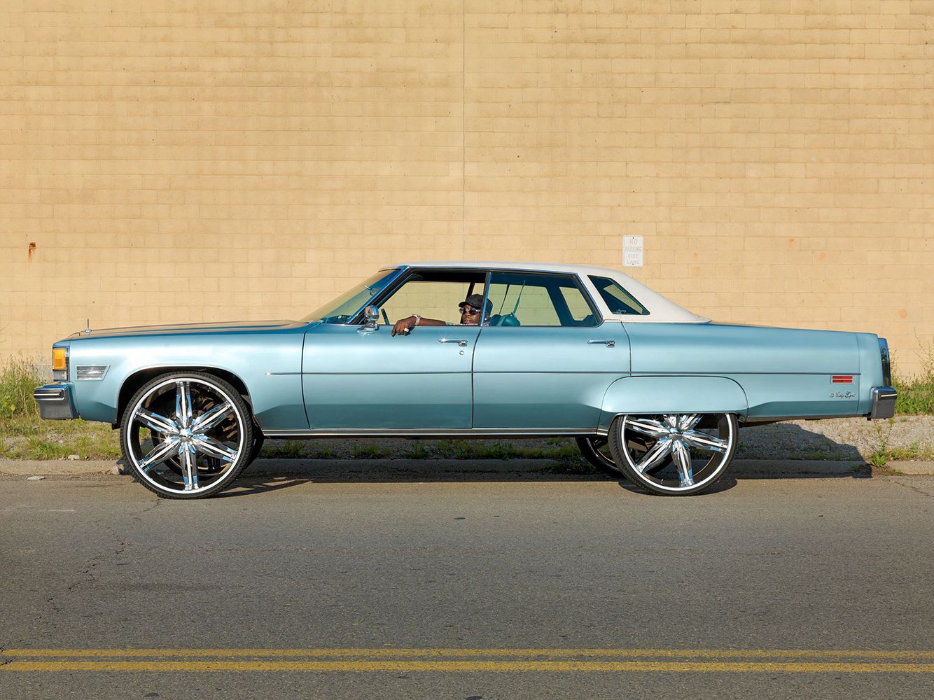Black Sitting in His1976 98 Olds "Donk",  Eastside, Detroit 2011