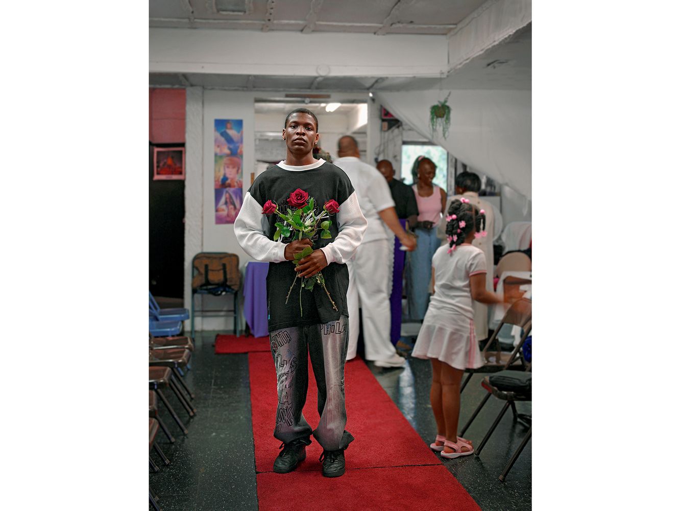 Young Man Holding Blessed Flowers, Grace Miracle Temple, 505 W. 79th, Chicago 2005