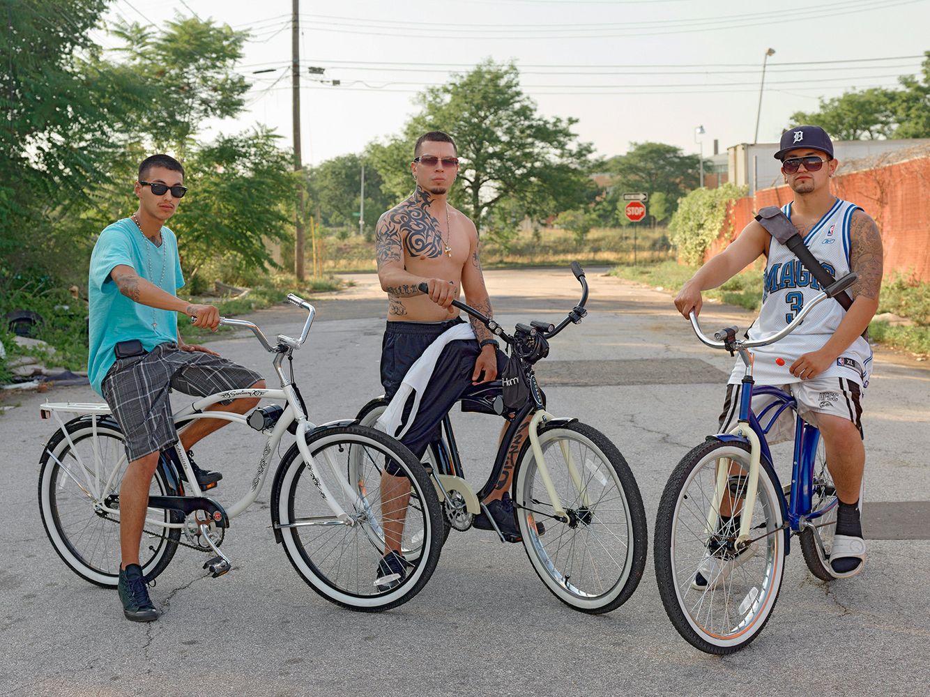 Three Guys (two brothers and their cousin) with Sunglasses and Tattoos Riding on Vintage Style Bikes, Southwest Side, Detroit 2011