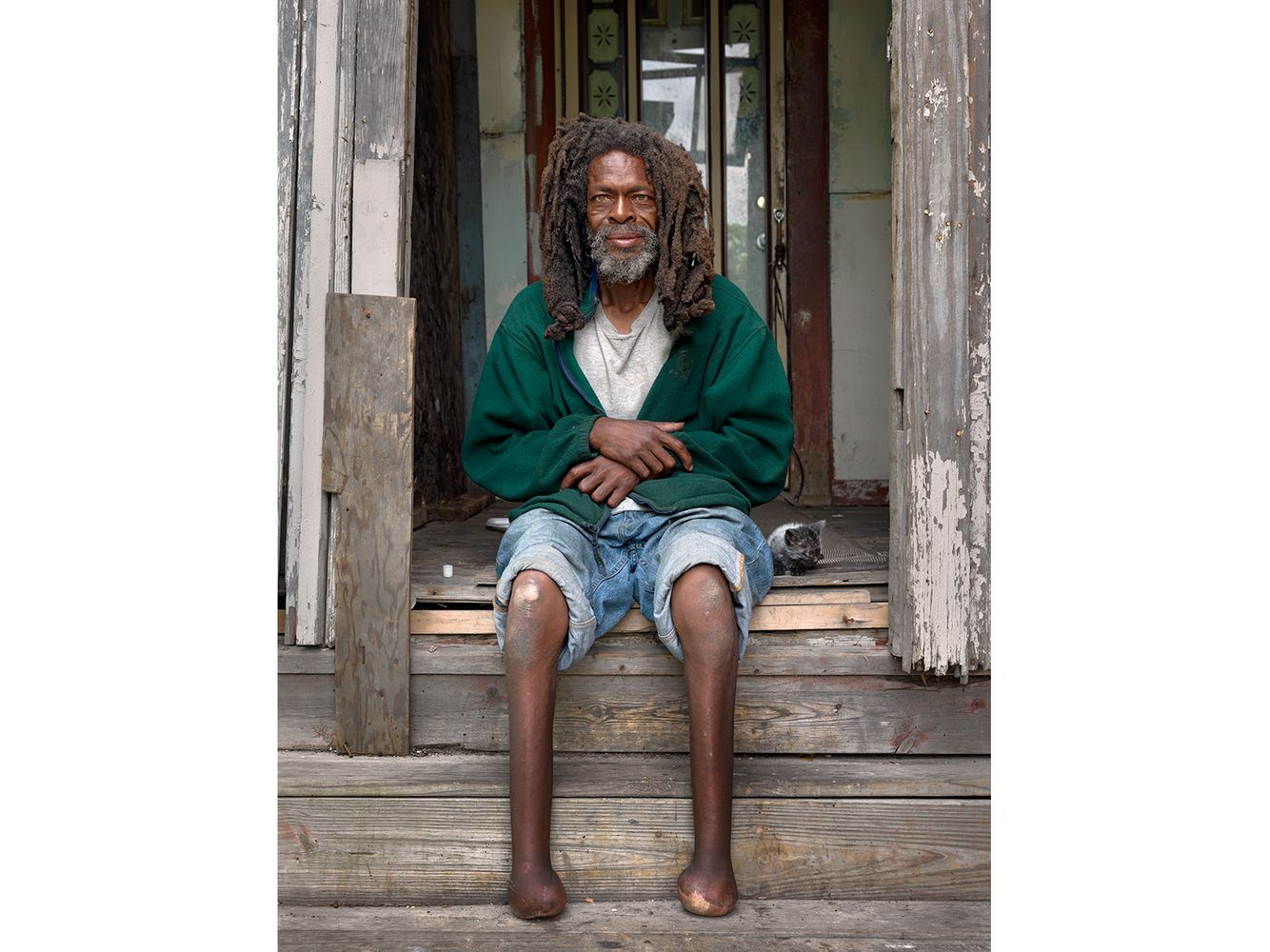 Michael Sitting on His Front Steps, Poletown, Eastside, Detroit 2011