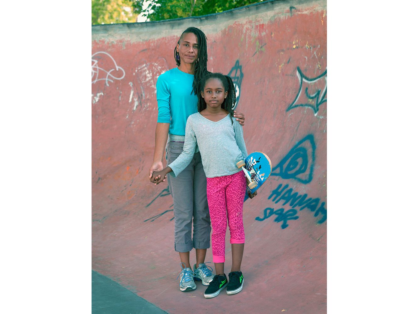 This skateboard park was built with a $30,000 grant from the Tony Hawk Foundation. The foundation seeks to foster lasting improvements in society, with an emphasis on supporting and empowering youth in disadvantaged communities. Mother and daughter in a Skateboard Park, Eastside, Detroit 2013