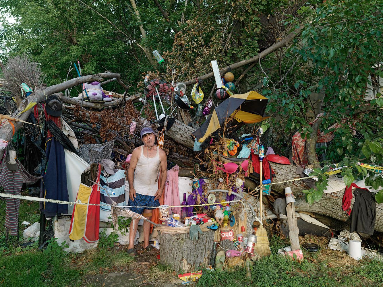 Migo Standing in front of His House, Eastside, Detroit 2011
