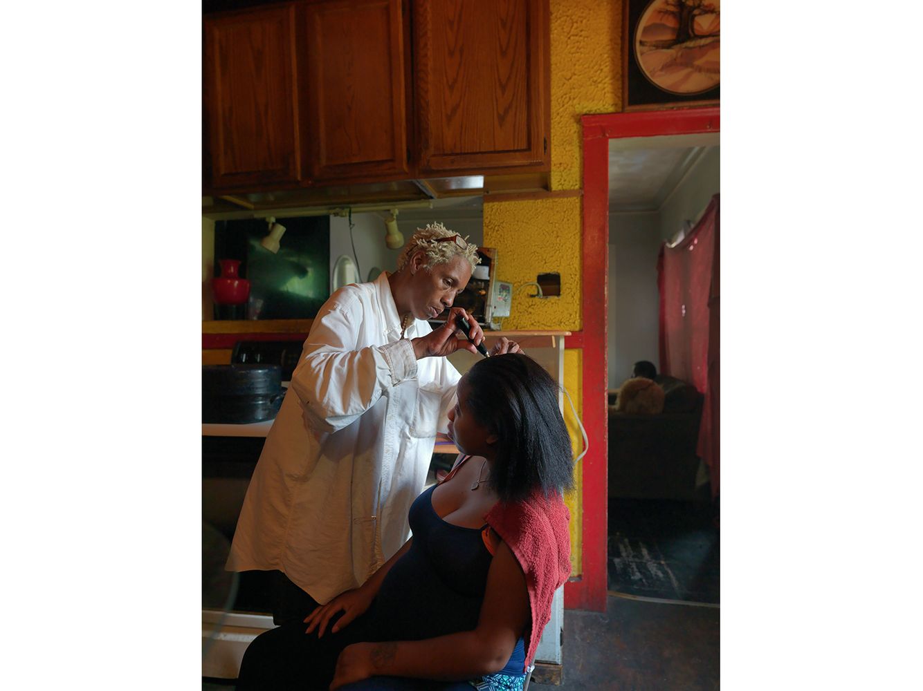 Kat Straightening Rochelle's Hair, Eastside, Detroit 2014