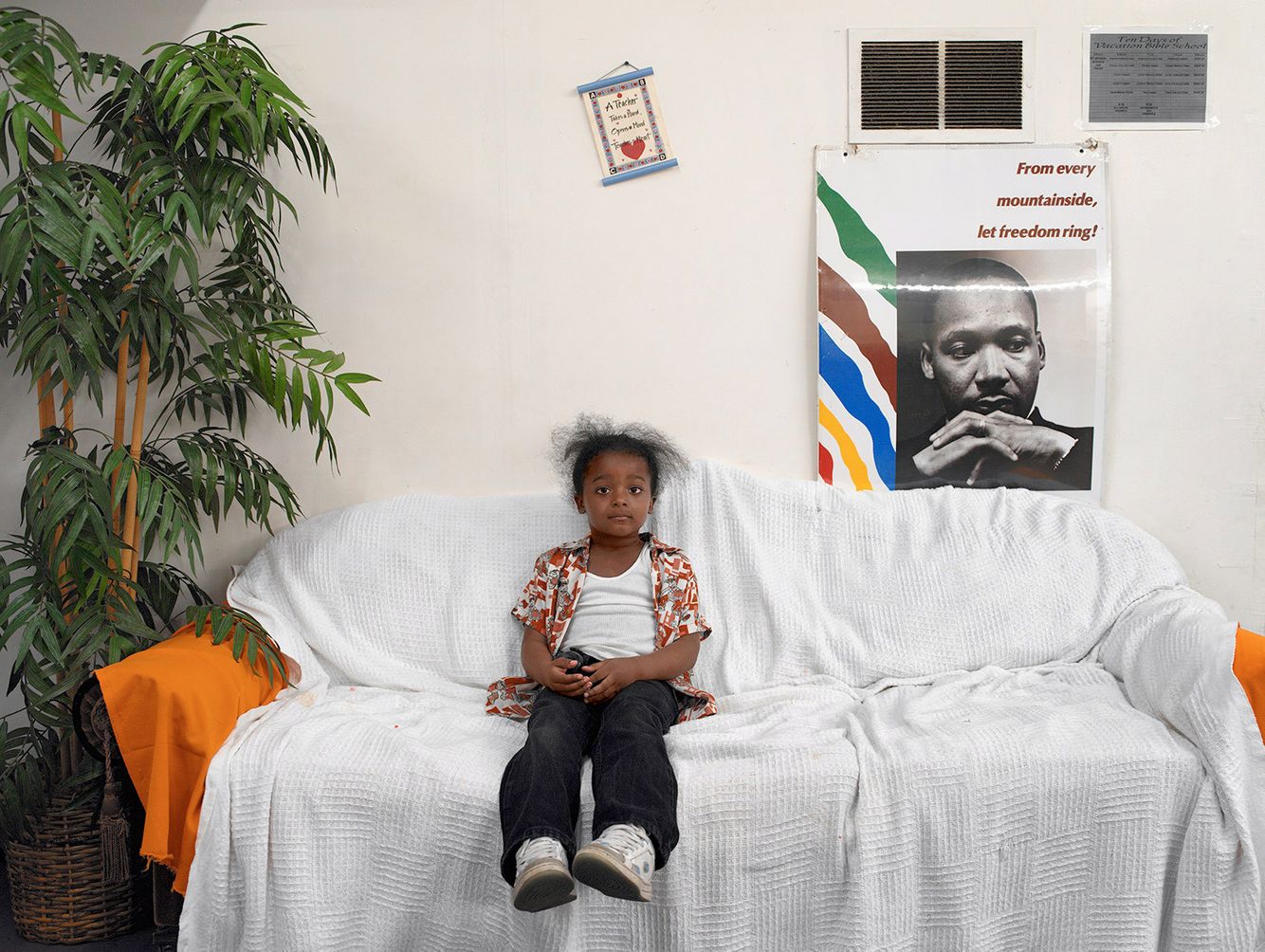 Young Boy with Poster, South Side Gospel Church, 863 E. 64th Street, Chicago 2004