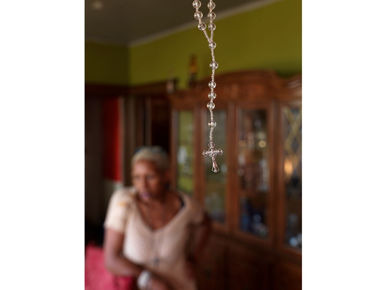 A Rosary Hanging in Kat's Living Room, Eastside, Detroit 2014