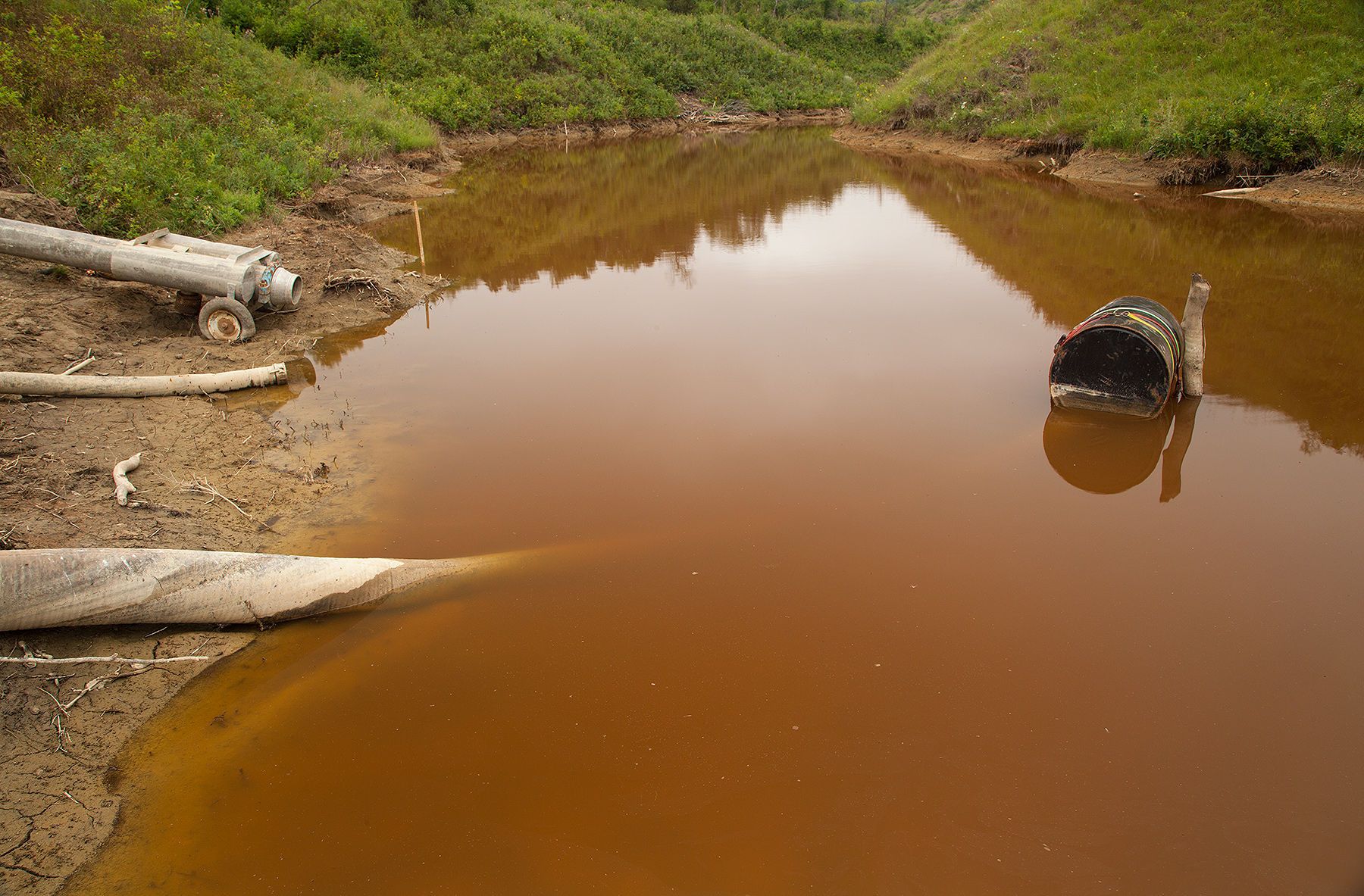 Contaminated pond downstream from the million gallon fracking wastewater spill