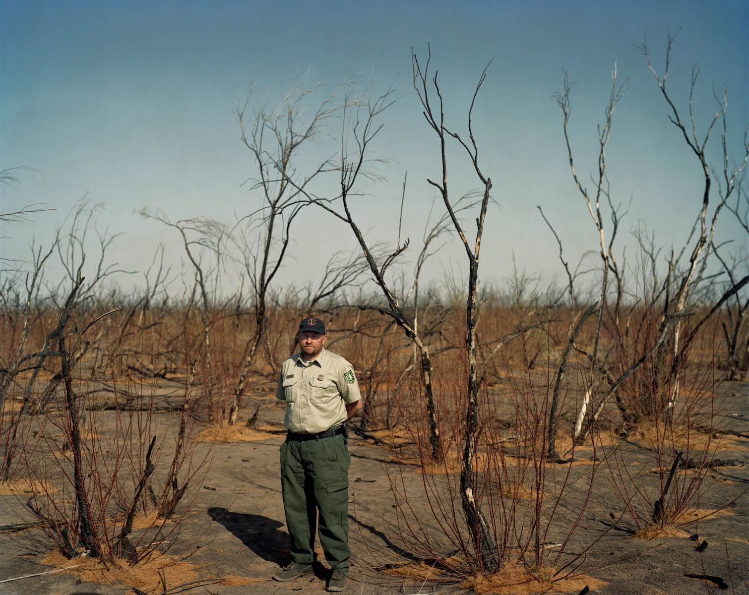 The Kincaid Fire lasted three and a half days and scorched 4,000 acres near the Pecos River between Artesia and Carlsbad, New Mexico.  The June 2008 wildfire  was human-caused, and most likely a case of arson, which Art says he sees in his ranger district fifteen to twenty-five times a year on average.  As Incident Commander, Arias was responsible for coordinating the various efforts related to suppressing the fire, which took place in an area interspersed with pump jacks and oil derricks, with petroleum being one of the biggest contributors to the regional economy. Art Arias, Site of 2008 Kincaid Fire, Outside of Carlsbad, New Mexico-9 Months Later