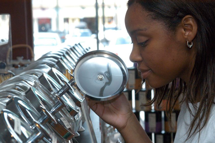 Selecting teas at the gourmet market, Belvedere Square