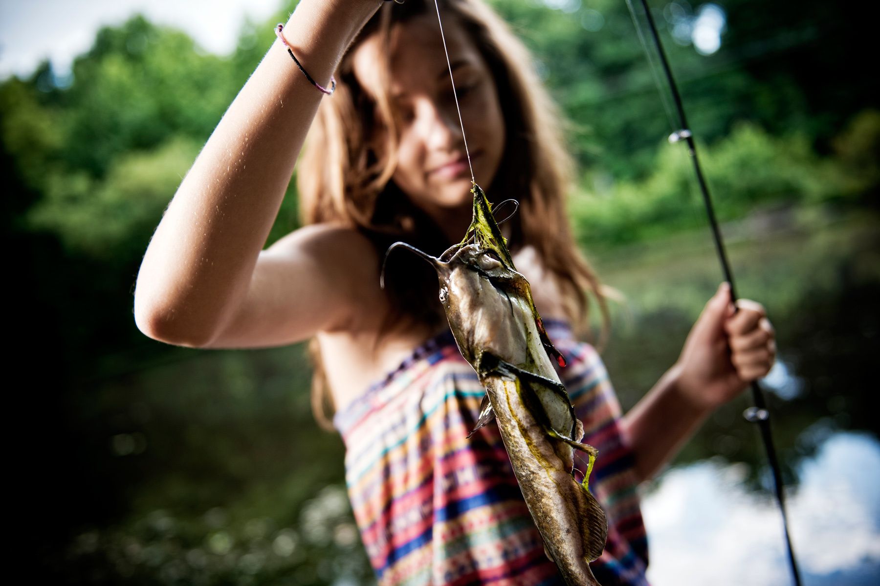 1hunting_and_gathering_young_woman_catches_catfish_dsc1609