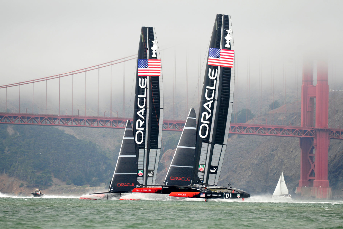 Oracle Team USA sails their AC72s near the Golden Gate Bridge