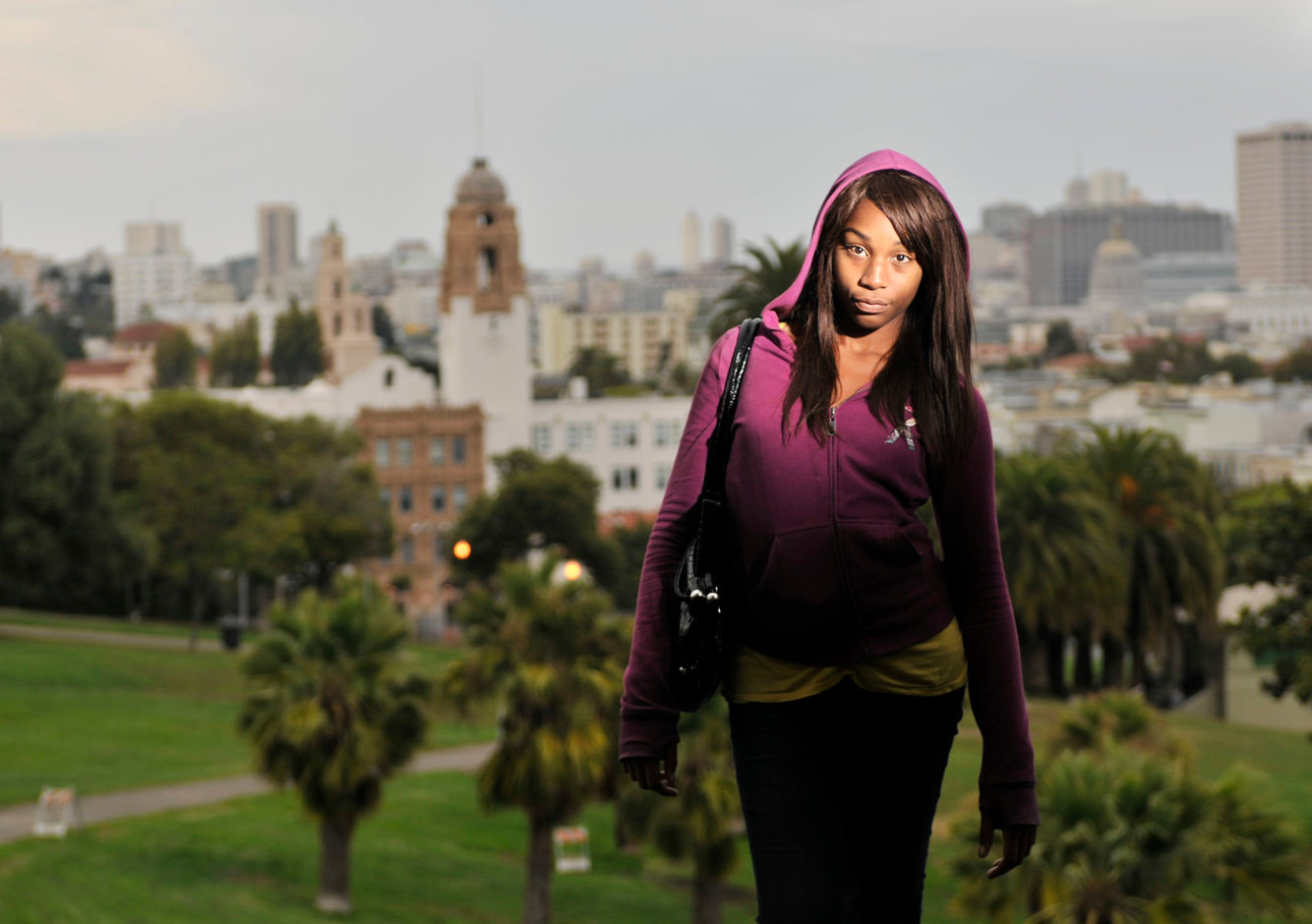 A transgender student victimized by bullying poses for a portrait near her San Francisco school.