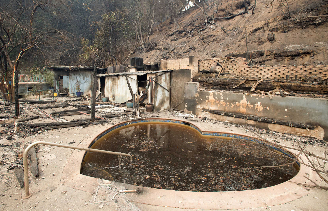 Burned out remains of the popular clothing-optional destination Harbin Hot Springs after the Valley fire tore through the area.