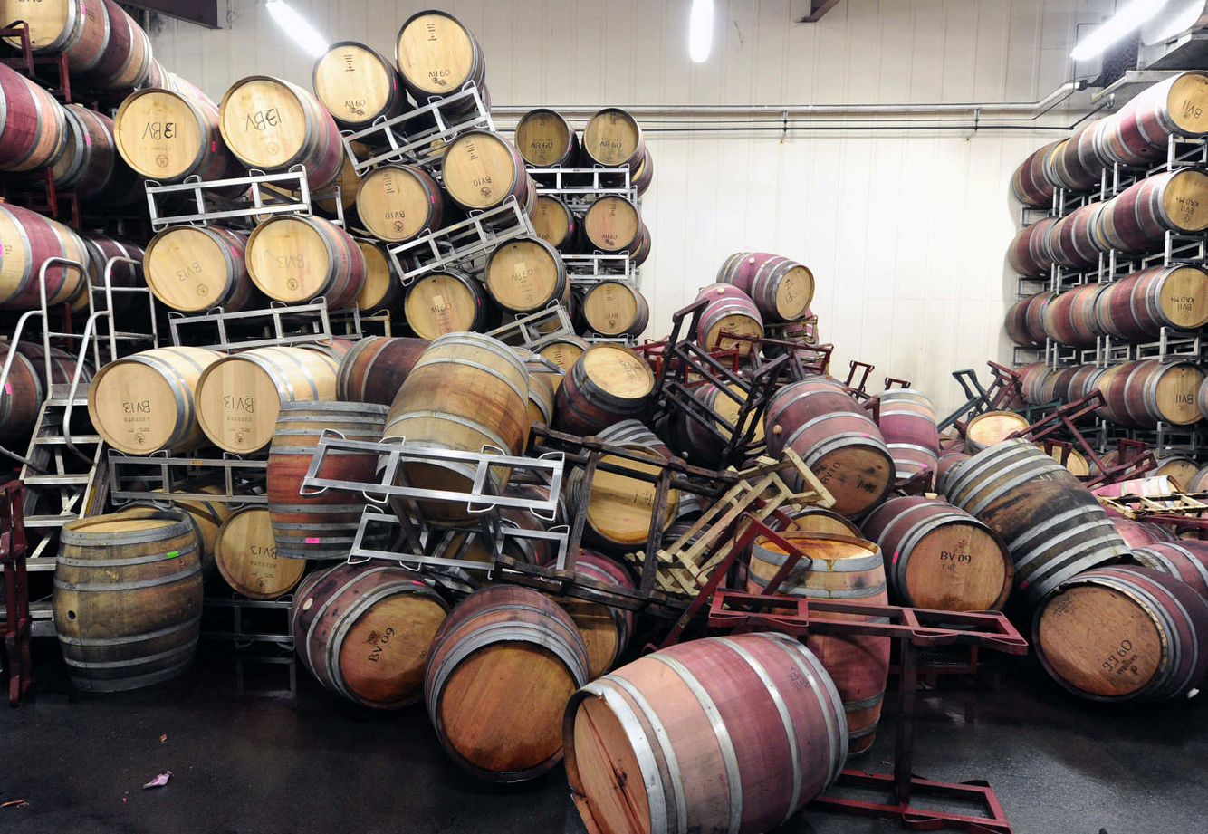 EARTHQUAKE: Barrels are strewn about at a winery in Napa, California after a 6.1 Earthquake struck the area.