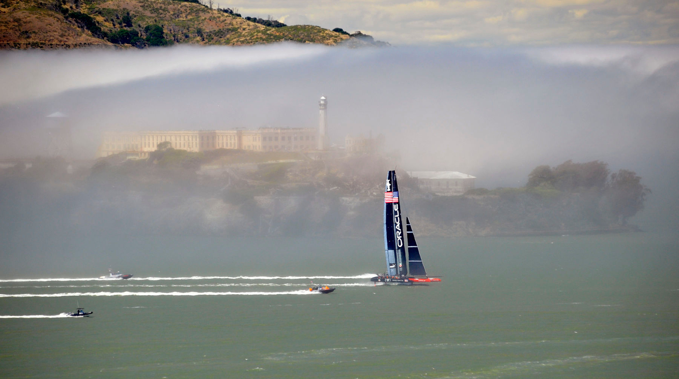 AMERICA'S CUP: Oracle Team USA sails their AC-72 Racing Yacht near Alcatraz before winning the tournament.
