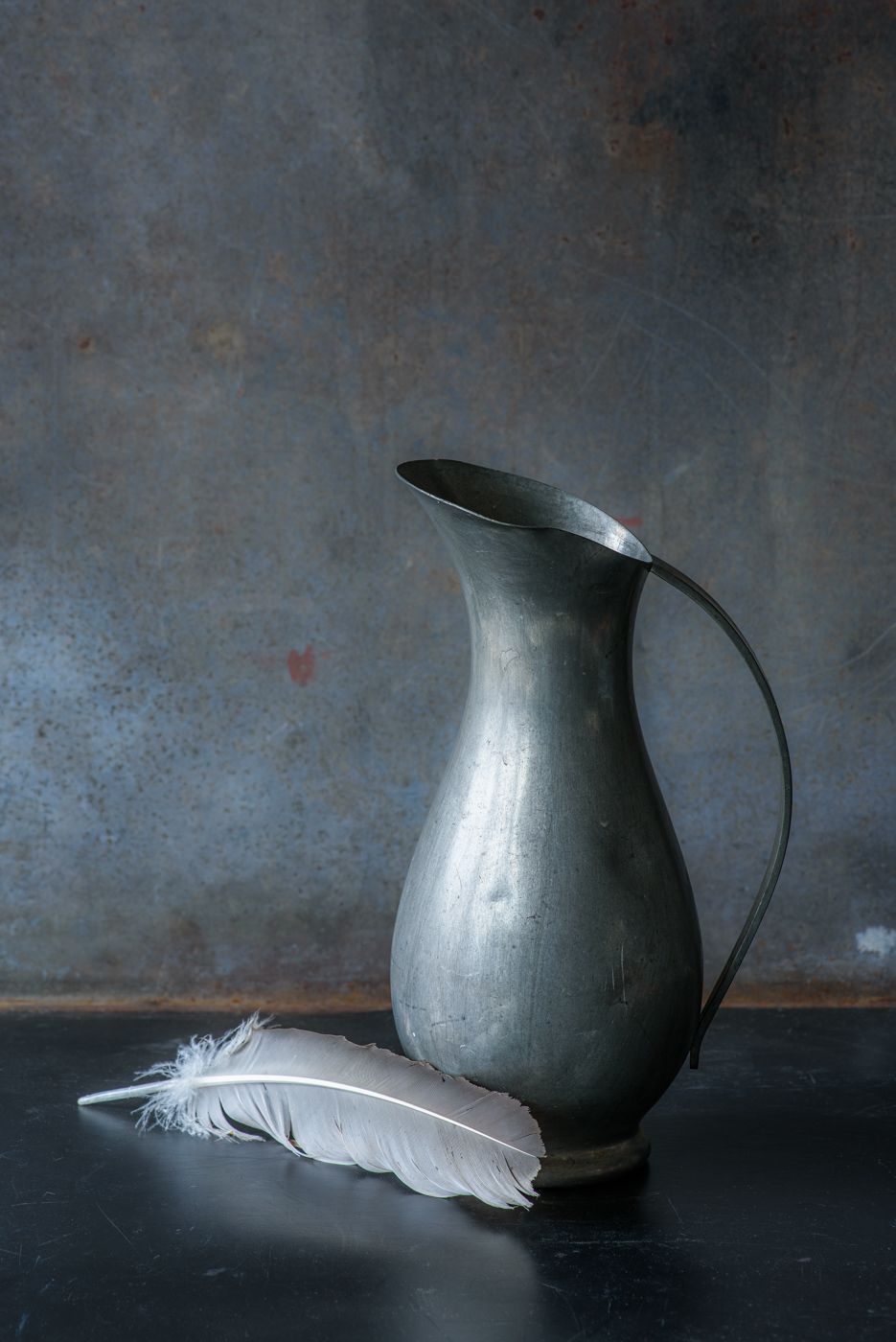 Lynn Karlin_Metal Pitcher with Feather.jpg