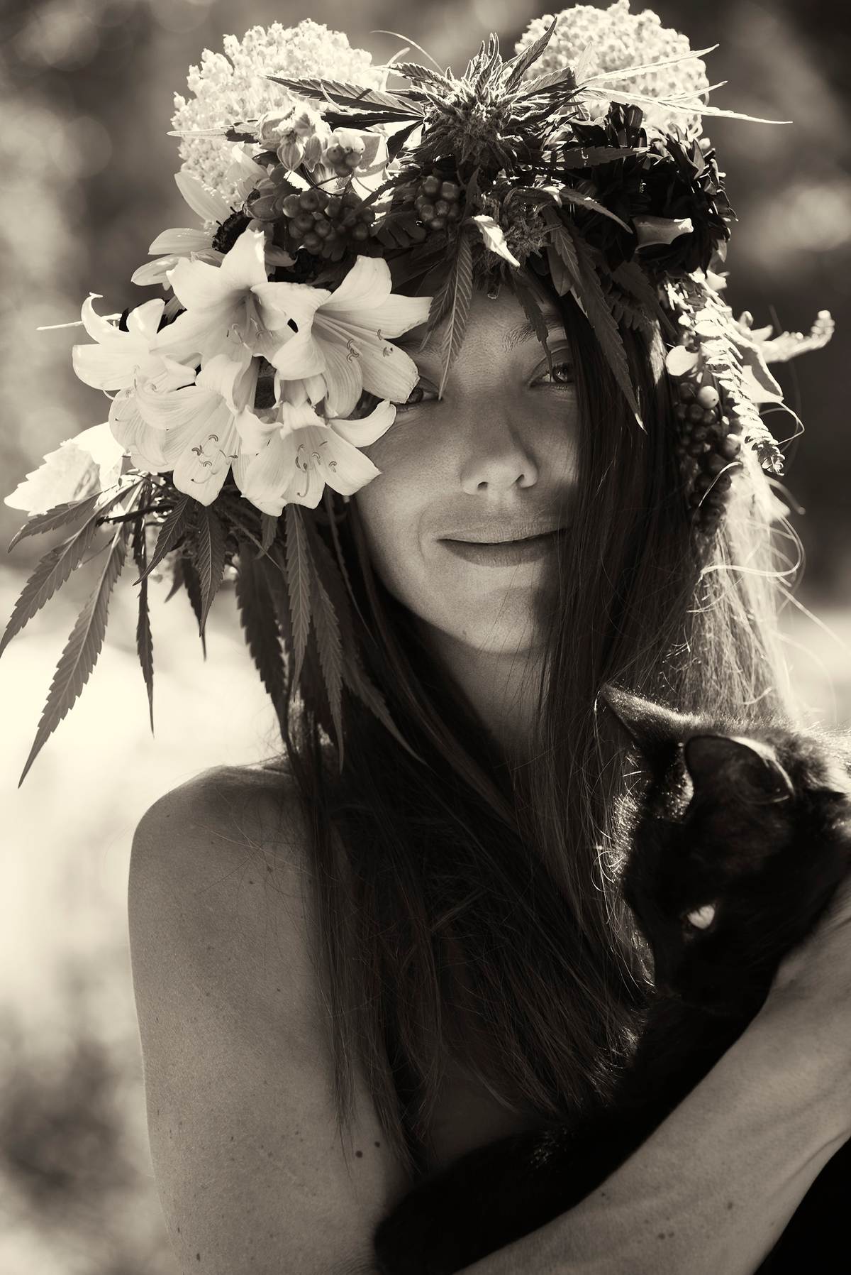FEMALE_cannabis_farmer_portraiture_flowers_closeup_face_sepia_fine_art_collectors_dorit_thies_beauty_los_angeles.jpg