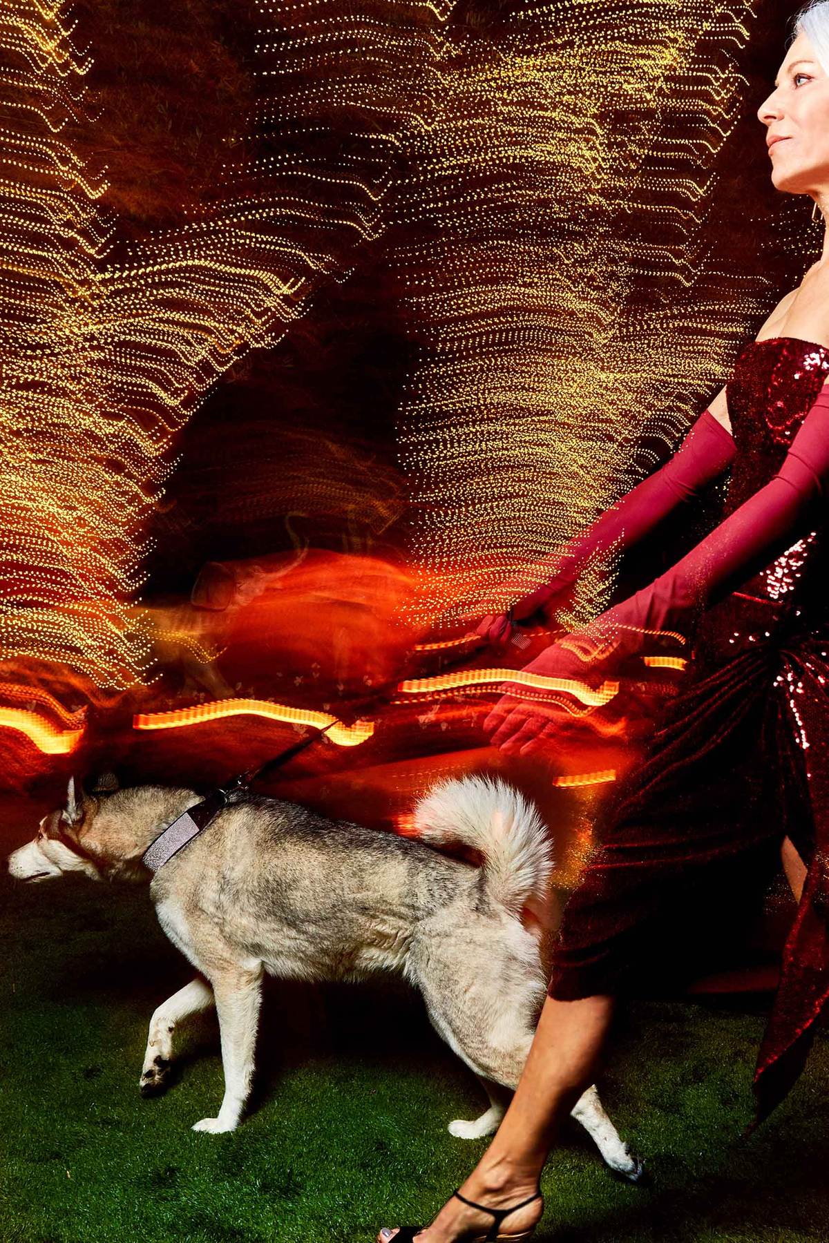 Woman with husky on  a leash walking through the nightVicky_Nylon_Runway_Wine-0793stephanie copy 2.jpg