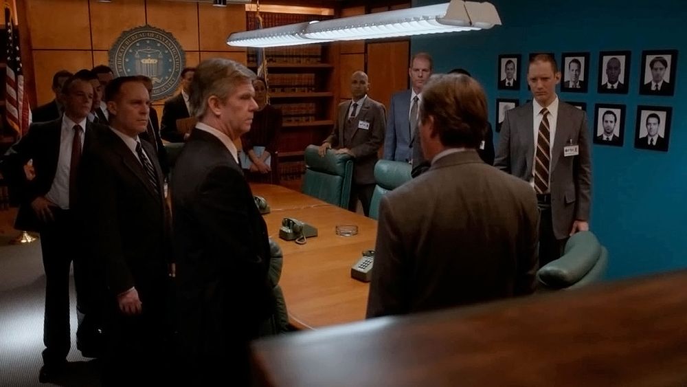 STAGE SET: J.Edgar Hoover Bldg, Washington D.C. FBI Conference Room, 1981