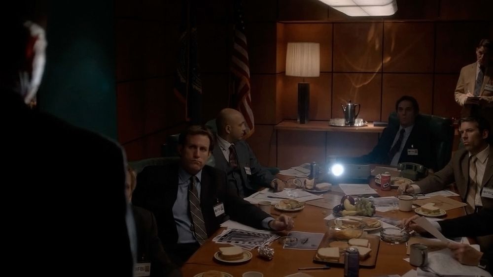 STAGE SET: J.Edgar Hoover Bldg, Washington D.C. FBI Conference Room, 1981