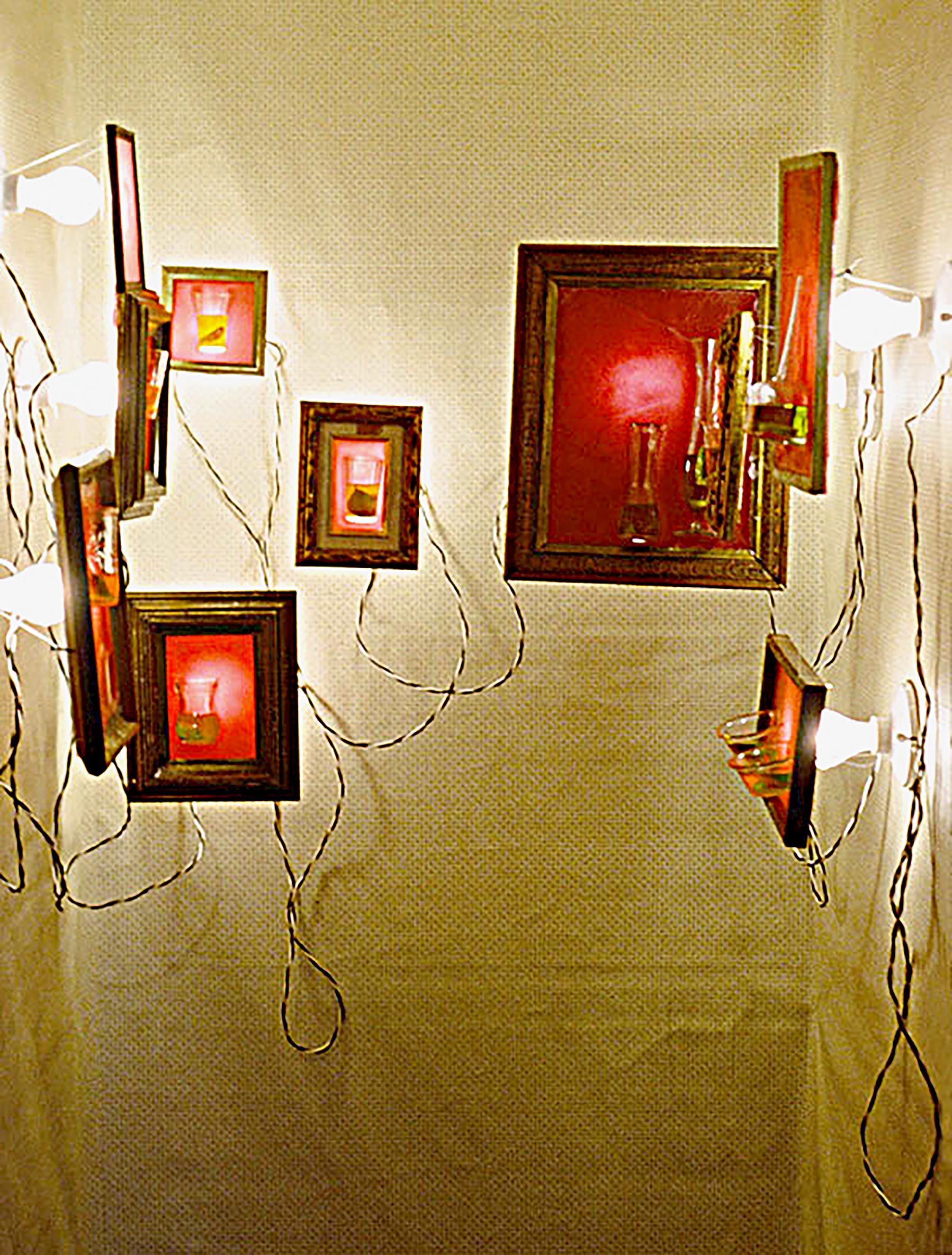 viewer activated installation of photographs oil and garlic embedded in melting wax Hall closet melting wax