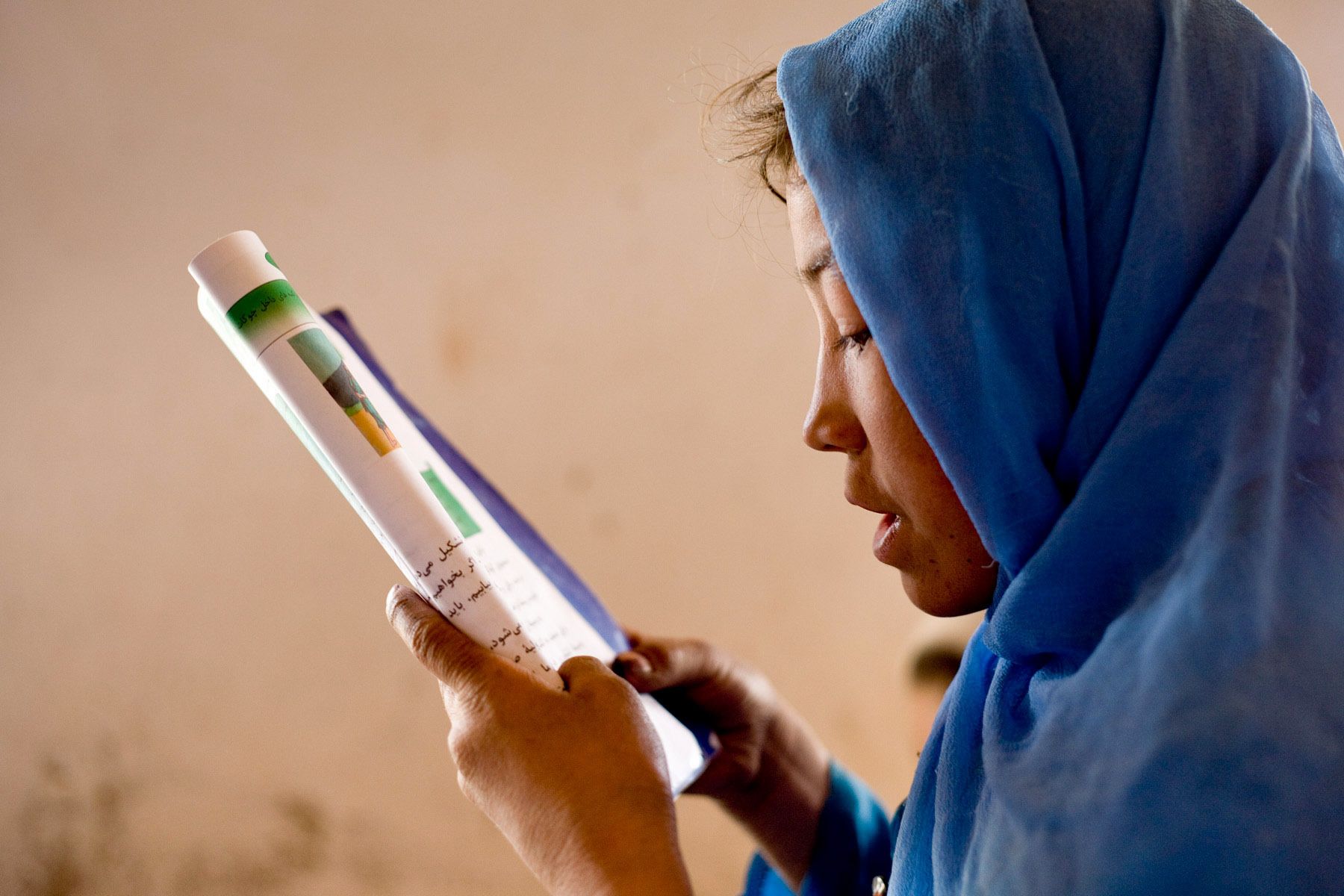 Reading in Dari, Zakaria Village, Afghanistan