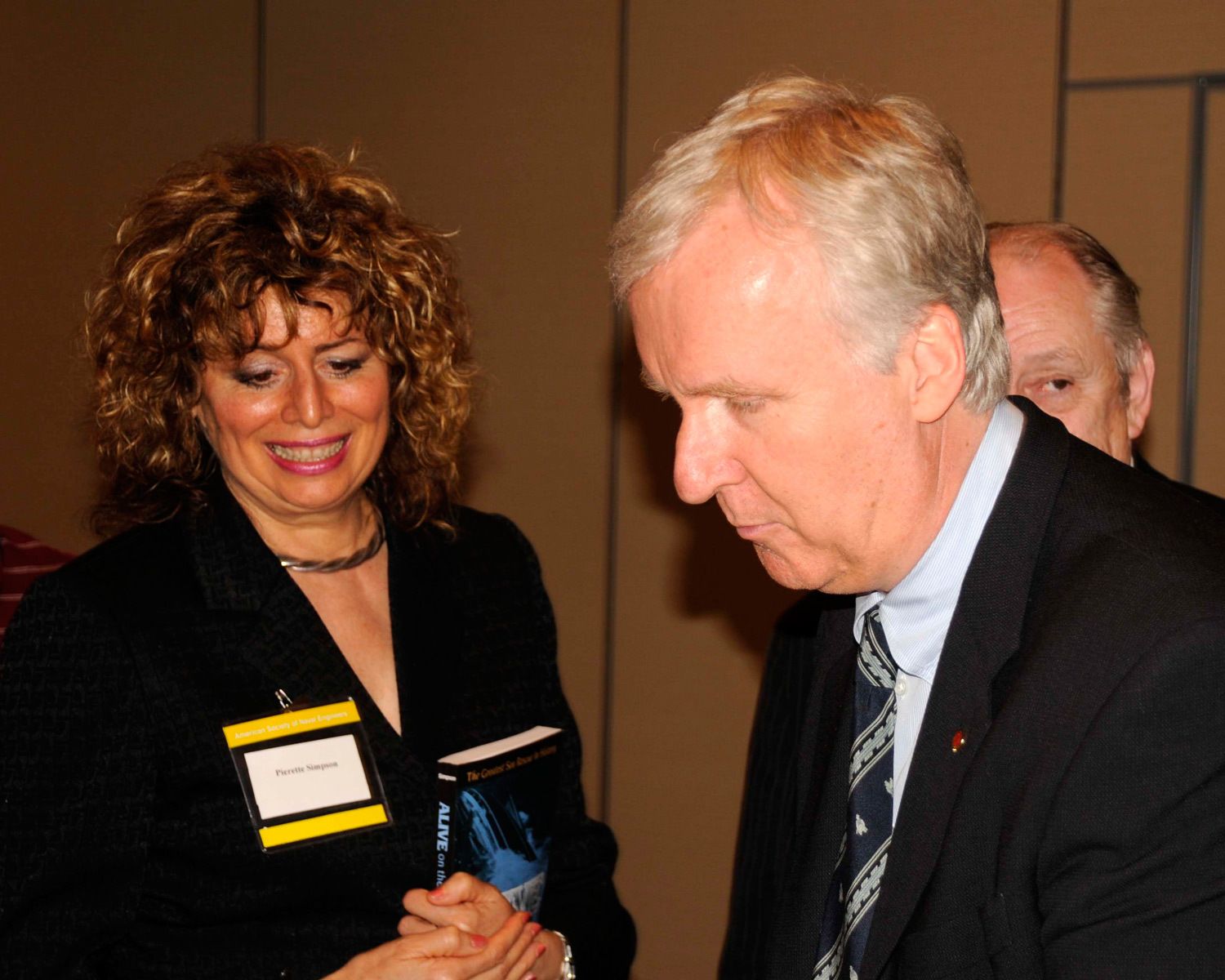 1james_cameron_and_author_pierette_simpson_the_bismarc_presentation_society_of_naval_architects_crystal_falls_virginia.jpg