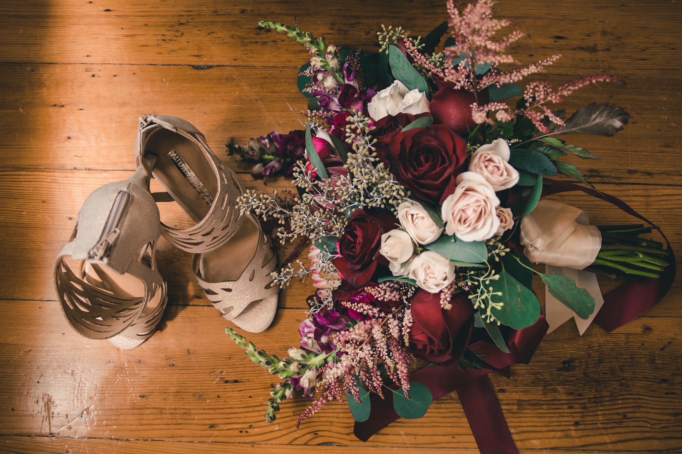 Bride's+shoes+and+flowers+seen+from+above.jpeg