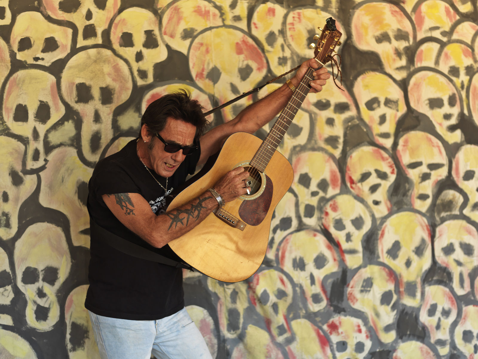 portrait of a musician playing acoustic guitar. Getty Images #88532041 Musician Jimmy Lee Dean