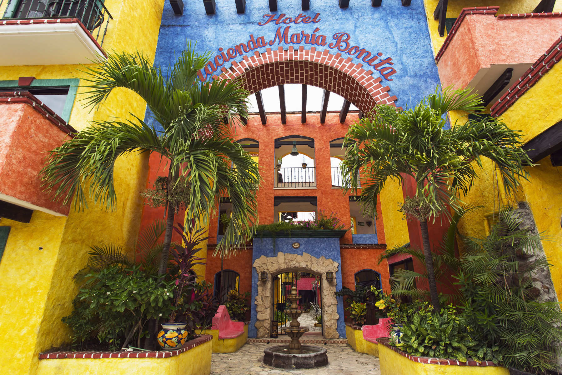 Mexico,Playa del Carmen,exterior of a colorful hotel. Alamy #CW3HXA exterior of a colorful hotel